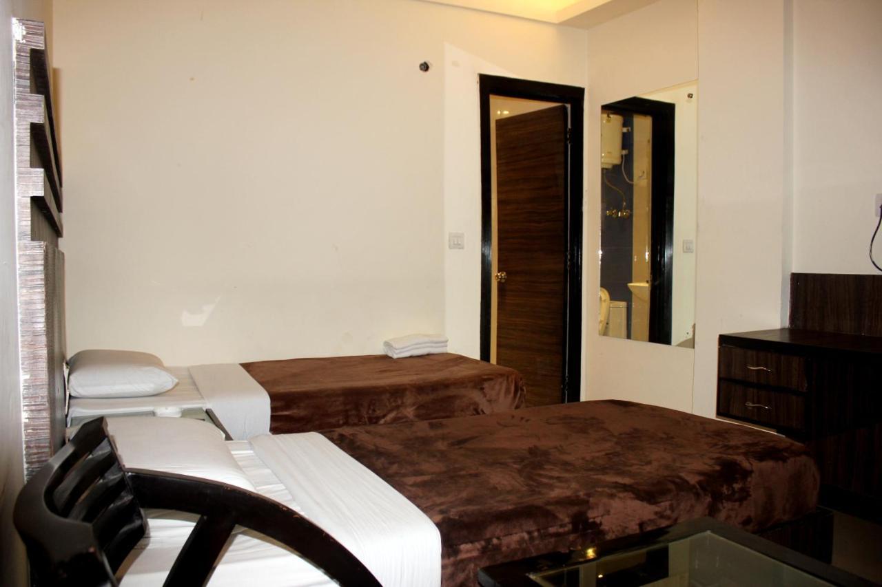 Hotel Aman Deluxe Neu-Delhi Exterior foto